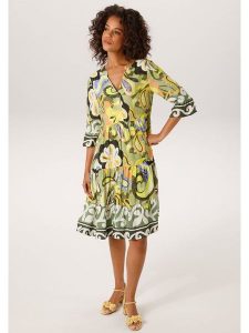 Aniston Sukienka w kolorze zielonym rozmiar: 46. Zielone sukienki Aniston, bez wzorów, z wiskozy, bez kołnierzyka, bez ramiączek, midi. Za 173,99 zł.