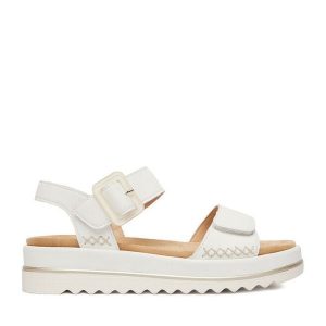 Sandały Remonte. Białe sandały Remonte, bez wzorów, bez obcasa, na płaskiej podeszwie, bez zapięcia. Za 379,99 zł.