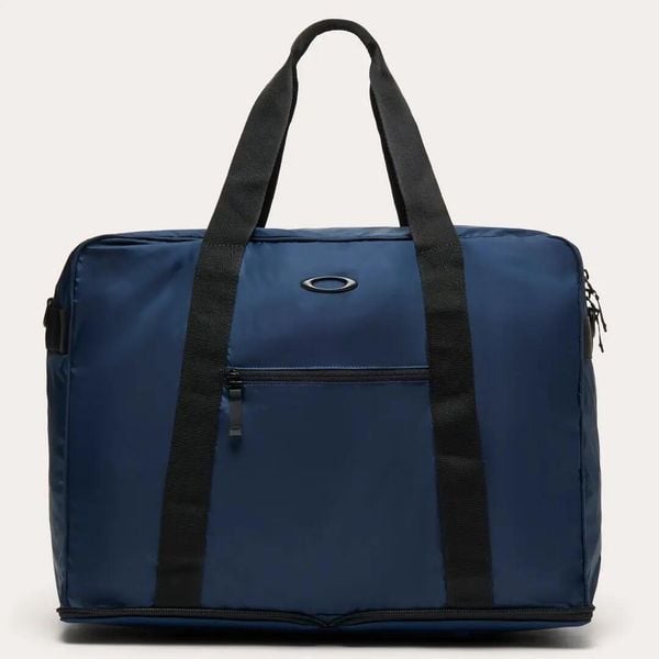 Torba podróżna Oakley PACKABLE 42 L. Niebieskie torby podróżne i sportowe Oakley, z aplikacjami, z neoprenu, na ramię. Za 289,18 zł.