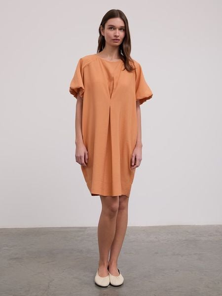 BGN Sukienka w kolorze pomarańczowym rozmiar: 38. Pomarańczowe sukienki BGN, na imprezę, bez wzorów, bez kołnierzyka, bez ramiączek, midi. Za 73,93 zł.