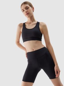 4F Legginsy kolarki treningowe z materiału z recyklingu damskie - czarne M. Czarne legginsy 4f, bez wzorów, z dzianiny. W wyprzedaży za 49,99 zł.