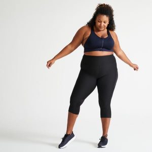 Legginsy fitness damskie Domyos 7/8. Czarne legginsy DOMYOS, bez wzorów, z materiału, z podwyższonym stanem, długie. Za 79,99 zł.