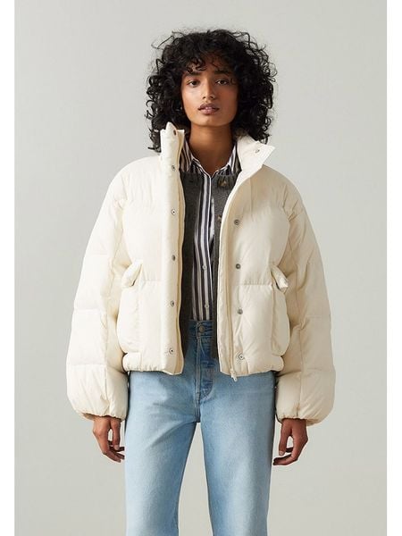 Levi's Kurtka puchowa w kolorze kremowym rozmiar: M. Brązowe kurtki Levi's®, m, bez wzorów, z puchu, bez kaptura. Za 360,17 zł.