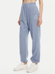 Tommy Hilfiger Spodnie dresowe UW0UW05793 Niebieski Regular Fit. Niebieskie spodnie dresowe TOMMY HILFIGER, s, bez wzorów, z bawełny. Za 179,99 zł.