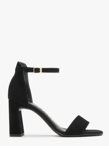 Czarne sandały w na obcasie. Czarne sandały Ryłko, bez wzorów, ze skóry, bez obcasa, na obcasie, bez zapięcia. W wyprzedaży za 179,99 zł.