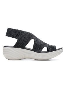 Clarks Skórzane sandały w kolorze antracytowym na koturnie rozmiar: 37,5. Czarne sandały Clarks, bez wzorów, z otwartym noskiem, bez obcasa, na koturnie, bez zapięcia. Za 110,55 zł.
