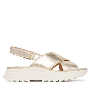 Sandały Clarks. Żółte sandały Clarks, bez wzorów, bez obcasa, na płaskiej podeszwie, bez zapięcia. Za 389,99 zł.