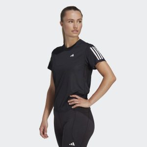 Koszulka do biegania damska Adidas Own the Run Tee. Czarne bluzki ADIDAS, bez wzorów, z materiału, sportowe, bez kołnierzyka, bez ramiączek. Za 130,99 zł.