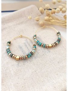 Atelier MIU Pozłacane kolczyki z turkusami rozmiar: onesize. Żółte kolczyki Atelier MIU, z turkusem, pozłacane. Za 39,99 zł.