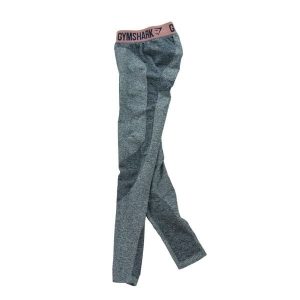 Second life - Damskie legginsy w kolorze granatowym - Stan bardzo dobry. Niebieskie legginsy Gymshark, bez wzorów. Za 101,48 zł.