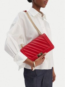 Badura Torebka TYL00495 Czerwony. Czerwone listonoszki Badura, bez wzorów, z materiału, bez dodatków. Za 199,99 zł.