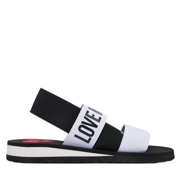 Sandały LOVE MOSCHINO. Białe sandały LOVE MOSCHINO, bez wzorów, bez obcasa, na płaskiej podeszwie, bez zapięcia. Za 329,99 zł.