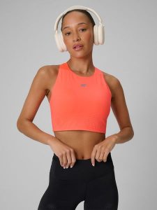 4F Crop top do biegania szybkoschnący damski - pomarańczowy S. Czerwone topy 4f, l, bez wzorów, bez kołnierzyka, bez ramiączek. Za 129,99 zł.