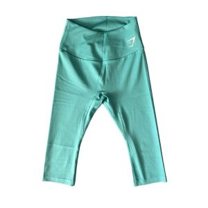 Legginsy treningowe damskie Gymshark Training Cropped. Zielone legginsy Gymshark, bez wzorów. Za 84,99 zł.
