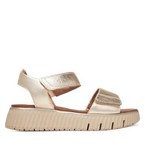Sandały Tamaris. Żółte sandały Tamaris, bez wzorów, bez obcasa, na koturnie, bez zapięcia. Za 349,99 zł.