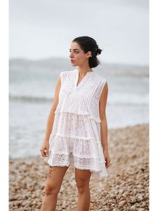 Isla Bonita by SIGRIS Sukienka w kolorze białym rozmiar: L. Białe sukienki Isla Bonita by SIGRIS, l, bez wzorów, z bawełny, bez kołnierzyka, bez ramiączek, mini, rozkloszowane. Za 223,99 zł.