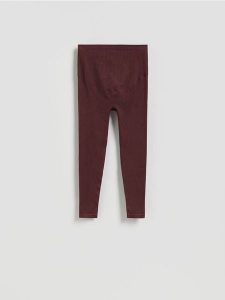 Bezszwowe legginsy - brązowy. Brązowe legginsy Reserved, bez wzorów, z dzianiny. Za 89,99 zł.