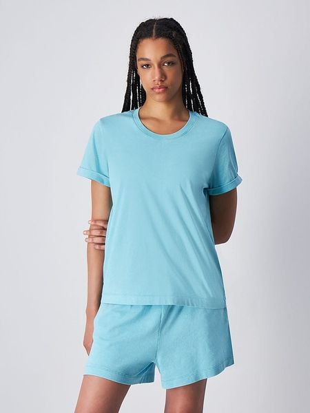 Champion Koszulka w kolorze błękitnym rozmiar: L. Niebieskie bluzki Champion, l, bez wzorów, z bawełny, bez kołnierzyka, bez ramiączek. Za 56,93 zł.