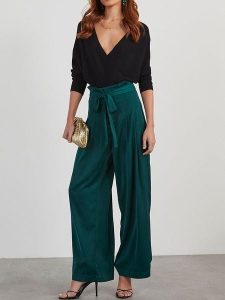 Milan Kiss Spodnie w kolorze morskim rozmiar: S. Niebieskie spodnie z wysokim stanem Milan Kiss, bez wzorów, z materiału, z podwyższonym stanem. Za 152,99 zł.