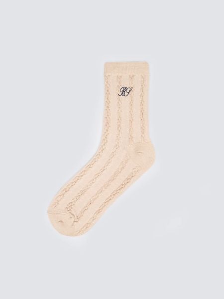 Skarpety damskie z wiskozą z warkoczowym splotem beżowe Brajda 801. Brązowe skarpetki Big Star, bez wzorów, z bawełny. Za 19,99 zł.