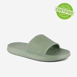 Klapki damskie Coqui Tora. Zielone klapki Coqui, bez wzorów, z materiału, bez obcasa. Za 116,99 zł.