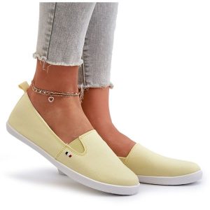 Tenisówki Trampki Slip-On Damskie Żółte Adrancia. Żółte trampki bez wzorów, bez zapięcia. Za 92,80 zł.