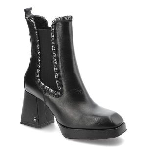 Czarne Botki Carinii Eleganckie Skórzane Buty Na Obcasie. Czarne botki Carinii, bez wzorów, ze skóry, bez obcasa, na obcasie, bez zapięcia. Za 589,00 zł.