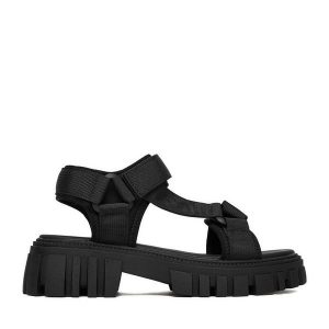 Sandały JENNY. Czarne sandały Jenny, bez wzorów, bez obcasa, na płaskiej podeszwie, bez zapięcia. Za 119,99 zł.