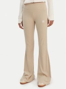 Adidas Legginsy Essentials KD3850 Beżowy Flared Leg. Brązowe legginsy ADIDAS, bez wzorów, z wiskozy. Za 219,99 zł.