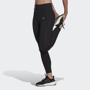 Legginsy Running Essentials. Czarne legginsy ADIDAS, bez wzorów, z materiału. Za 162,99 zł.