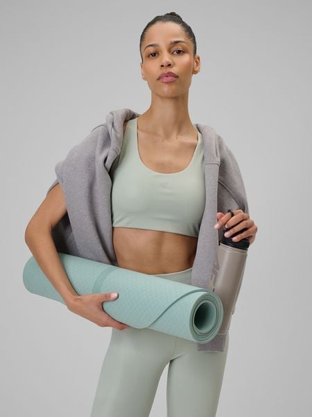 4F Biustonosz do jogi z niskim wsparciem damski - miętowy S. Niebieskie biustonosze 4f, bez wzorów, z gumy. Za 129,99 zł.