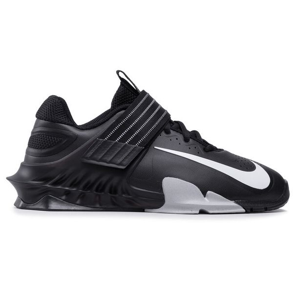 Buty na siłownię Nike. Czarne buty sportowe Nike, bez wzorów, bez zapięcia, na fitness i siłownię. Za 399,99 zł.