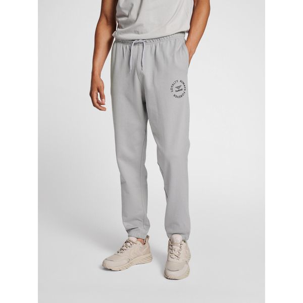 Spodnie do biegania Hummel GC Loyalty. Czarne spodnie dresowe Hummel, bez wzorów, z materiału, sportowe. Za 244,50 zł.