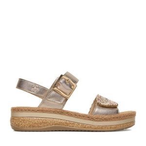 Sandały Rieker. Żółte sandały Rieker, bez wzorów, bez obcasa, na płaskiej podeszwie, bez zapięcia. Za 349,99 zł.