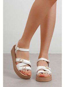 C'M Sandały w kolorze białym na koturnie rozmiar: 40. Białe sandały C'M, bez wzorów, z otwartym noskiem, bez obcasa, na koturnie, bez zapięcia. Za 113,99 zł.