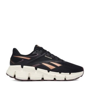 Buty na siłownię Reebok. Czarne buty sportowe Reebok, bez wzorów, bez zapięcia, na fitness i siłownię. Za 369,99 zł.