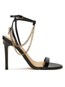 Guess Sandały Miamy FLDMIA PAF03 Czarny. Czarne sandały Guess, z aplikacjami, ze skóry, bez obcasa, na szpilce, bez zapięcia. Za 529,99 zł.