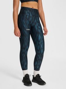 Damskie legginsy Hummel AOP Hiit Intensity. Niebieskie legginsy Hummel, bez wzorów, z materiału. Za 282,40 zł.