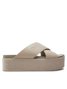 Calvin Klein Jeans Klapki Flatform Cross Mg Uc YW0YW01349 Beżowy. Brązowe klapki Calvin Klein Jeans, bez wzorów, z jeansu, bez obcasa. Za 259,99 zł.