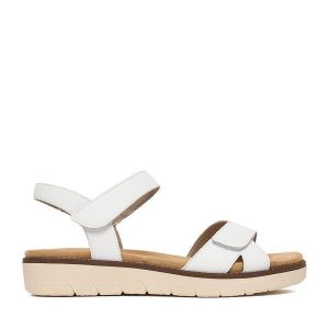 Sandały Remonte. Białe sandały Remonte, bez wzorów, bez obcasa, na płaskiej podeszwie, bez zapięcia. Za 369,99 zł.