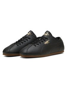Puma Skórzane sneakersy "Puma Tackle L" w kolorze czarnym rozmiar: 39. Czarne trampki Puma, bez wzorów, bez zapięcia. Za 159,95 zł.