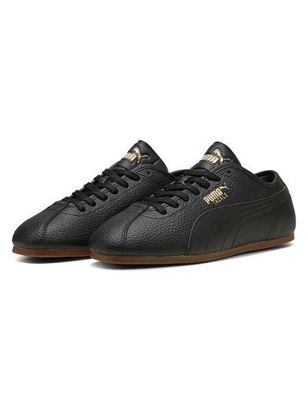Puma Skórzane sneakersy "Puma Tackle L" w kolorze czarnym rozmiar: 40. Czarne trampki Puma, bez wzorów, bez zapięcia. Za 161,45 zł.
