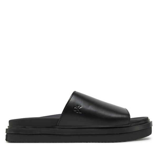 Klapki Calvin Klein Jeans. Czarne klapki Calvin Klein Jeans, bez wzorów, z jeansu, bez obcasa. Za 219,99 zł.