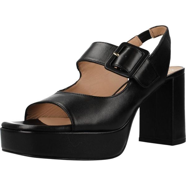 Sandały UNISA ODELA NTO Czarny. Czarne sandały Unisa, bez wzorów, ze skóry, bez obcasa, bez zapięcia. Za 596,99 zł.