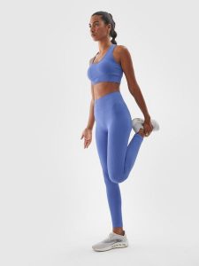 4F Legginsy treningowe bezszwowe z wysokim stanem damskie - granatowe M/L. Niebieskie legginsy 4f, bez wzorów, z dzianiny, z podwyższonym stanem. W wyprzedaży za 79,99 zł.