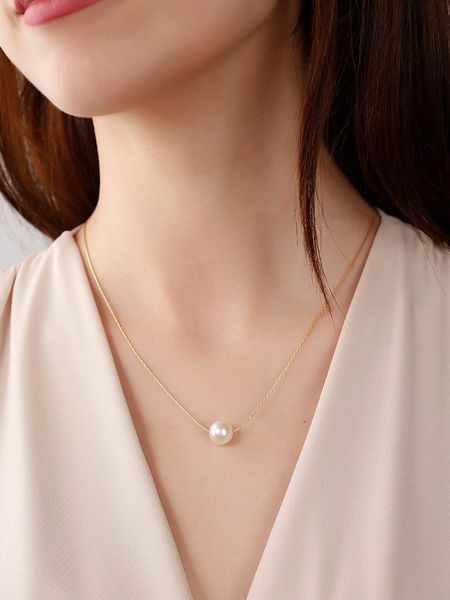 Nakkash Pozłacany naszyjnik z perłami - 42 cm rozmiar: onesize. Żółte naszyjniki Nakkash, z perłą, metalowe. Za 78,47 zł.