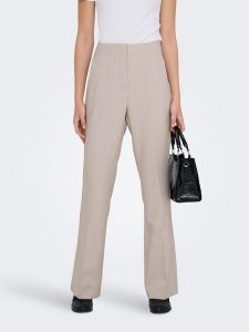 ONLY Spodnie "Raven" w kolorze beżowym rozmiar: 34/L32. Brązowe spodnie z wysokim stanem ONLY, bez wzorów, z materiału, z podwyższonym stanem. Za 104,99 zł.