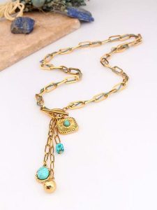 Charlize Pozłacany naszyjnik z turkusami - dł. 65 cm rozmiar: onesize. Żółte naszyjniki Charlize, z turkusem, pozłacane. Za 100,28 zł.