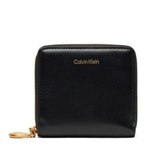 Portfel Calvin Klein. Czarne portfele Calvin Klein, bez wzorów. Za 179,99 zł.