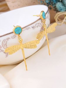 L'Atelier de Gaia Pozłacane kolczyki-wkrętki z turkusem rozmiar: onesize. Żółte kolczyki L'Atelier de Gaia, z turkusem, pozłacane. Za 63,45 zł.